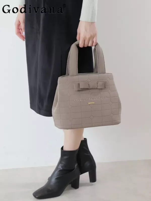 Bolso de lona de estilo japonés para mujer, bolsa de viaje con hermoso Lazo, bolso de mano bonito, accesorios de equipaje, otoño e invierno, nuevo
