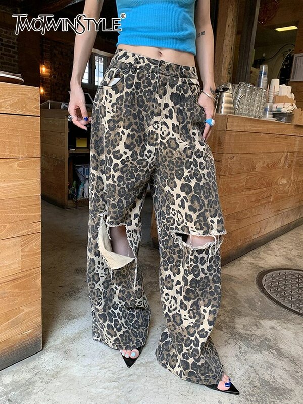 TWOTWINSTYLE calças de ganga de leopardo oco para mulheres de cintura alta emendadas com pernas largas de bolso