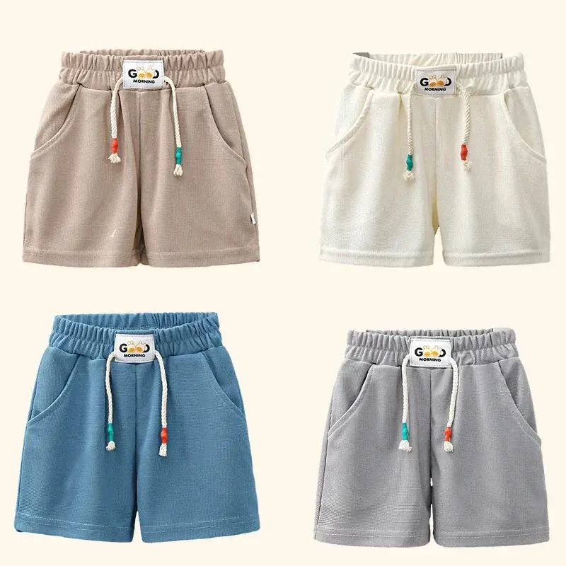 Nuovi pantaloncini estivi per ragazzi pantaloncini da spiaggia Color caramella per bambini Casual elastico in vita pantaloni corti per bambini abbigliamento sportivo Outwear