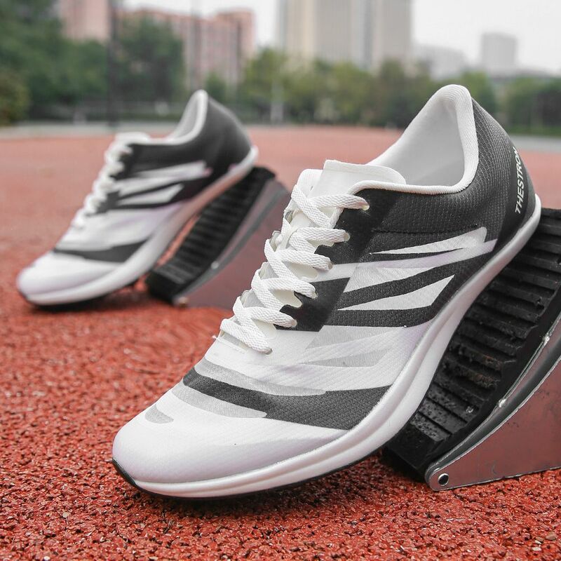 Men Women Professional Carbon Plate Rebound Track Field Event Spikes Shoes Short Running Training 7 Spikes Sprint Sneakers