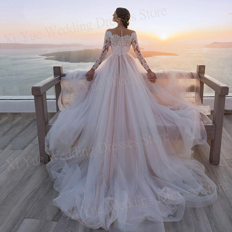 Eleganckie urocze damskie sukienki ślubne piękne aplikacje koronkowe suknie panny młodej z długim rękawem księżniczka ساتين حفلات الزفاف