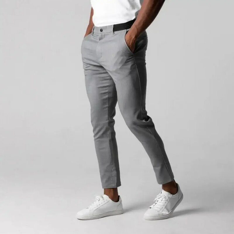 Pantalones de Color sólido para hombre, pantalones formales de negocios con cintura elástica, botón, cierre de cremallera, bolsillos, Color sólido, suave