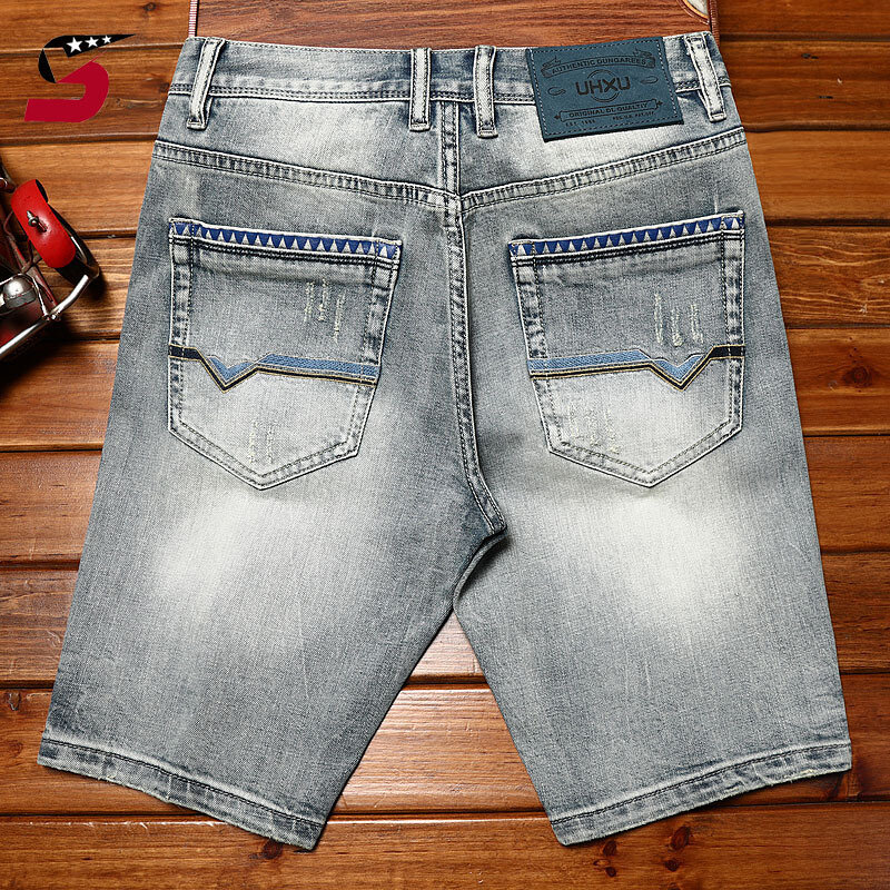 กางเกงห้าส่วนสไตล์เกาหลีกางเกงแฟชั่นขาดๆสไตล์เกาหลีเทรนด์ลำลองของผู้ชาย celana pendek DENIM ฤดูร้อน