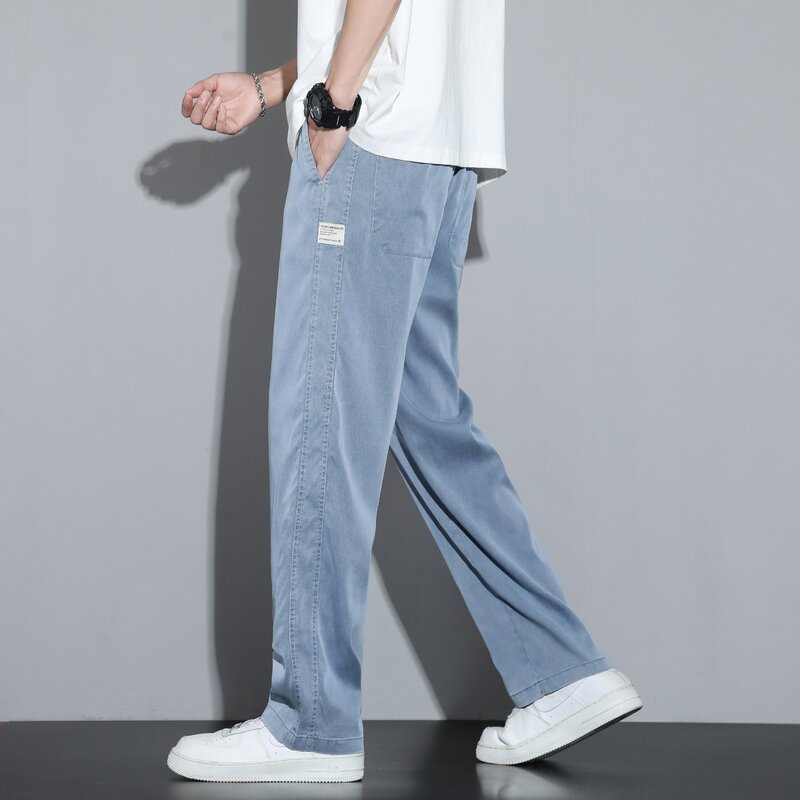 Jeans da uomo in tessuto morbido Lyocell estivo pantaloni dritti larghi sottili con coulisse vita elastica pantaloni Casual coreani Plus Size M-5XL