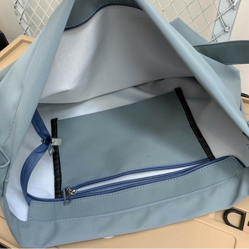 2023 Mannen En Vrouwen Grote Capaciteit Messenger Bag Crossbody Tas Student Bag Hoge Kwaliteit Canvas Reizen Outdoor Fitness tas