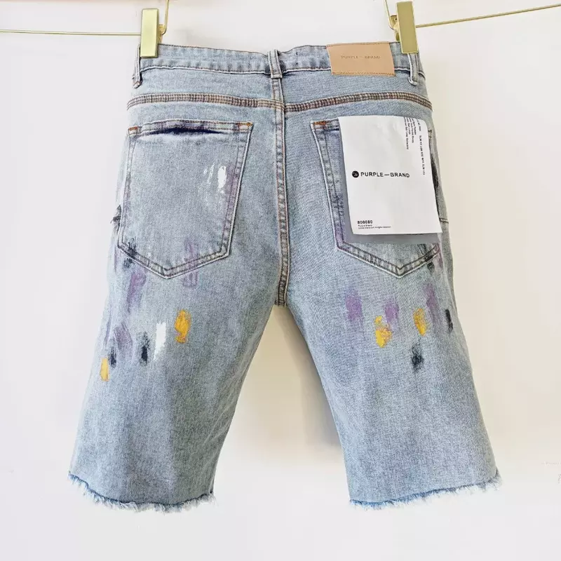 Jeans di marca viola di alta qualità Street trend bordo in pelliccia da uomo che spruzza vernice a inchiostro pantaloni da uomo slim fit e hole patch in denim