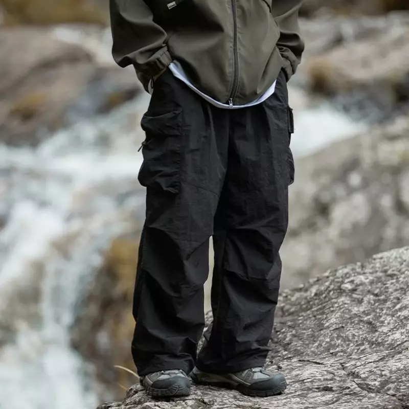 Celana kargo pria musim panas Y2K celana kargo celana panjang longgar kaki lebar kantong luar ruangan Denim musim semi modis fungsional celana mendaki gunung