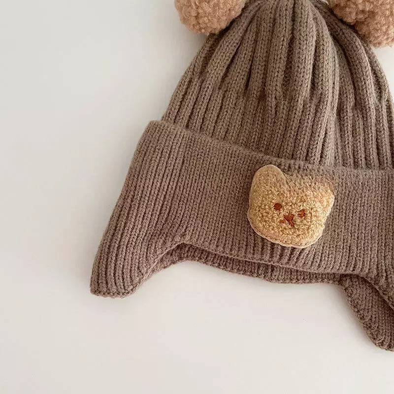 หมวกขนสัตว์เด็กน่ารักหมีปิดหูกันหนาวหมวกเด็กฤดูหนาวข้นความร้อนถักหมวก