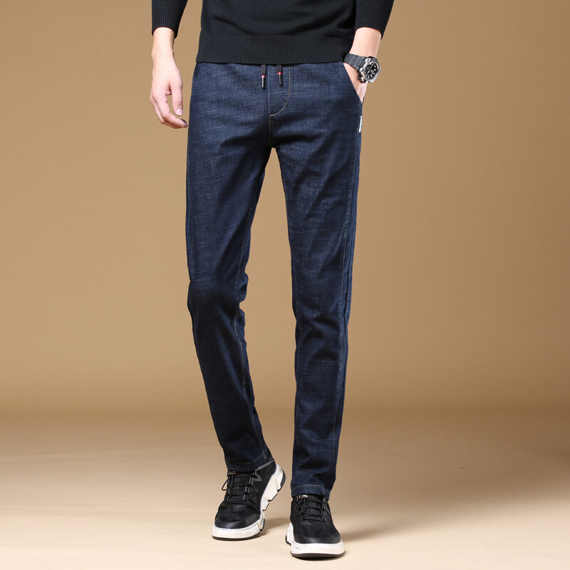 Celana jins elastis untuk pria, celana denim kota mode pinggang elastis longgar ukuran ekstra besar musim semi kaki lurus 2023