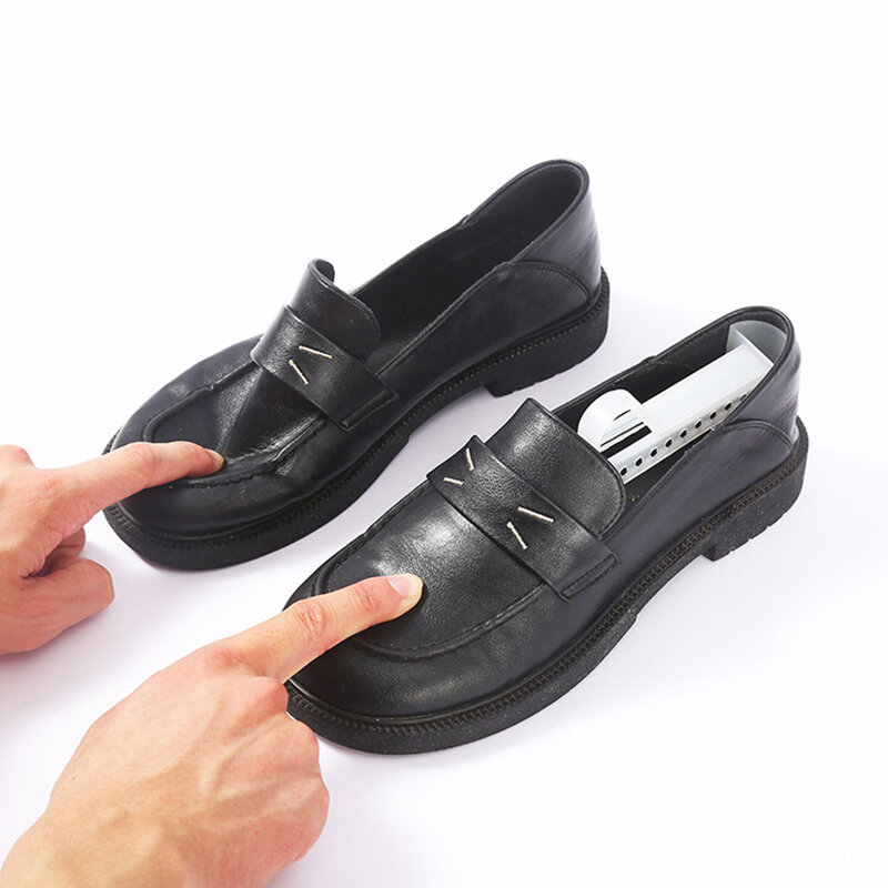 1ペアブラックプラスチック靴ツリーシェイパー形状ストレッチャ調節可能な女性男性ユニセックス