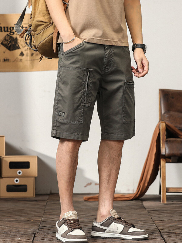 Nowy męskie szorty bojówki letni bawełniane spodenki mody Casual Men luźna, wysoka jakości jednolity kolor spodenki sportowe szorty Cargo dla mężczyzn