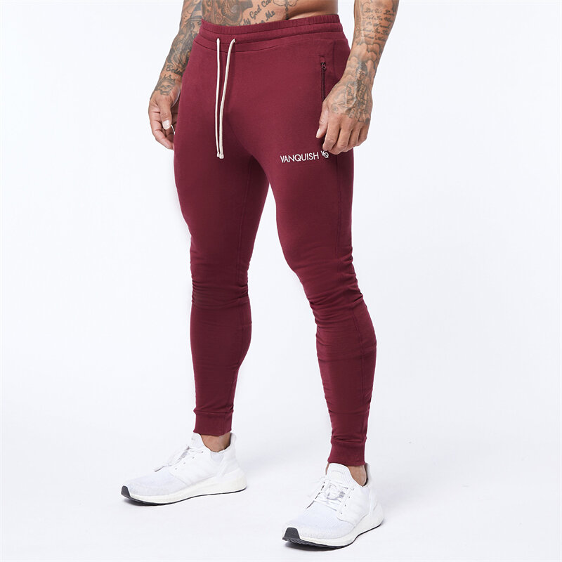Pantaloni da uomo slim in cotone rosso vino abbigliamento da strada casual pantaloni sportivi da palestra da uomo fitness da uomo all'aperto.