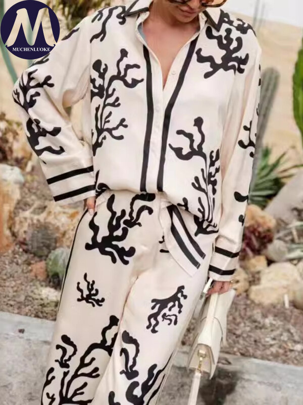 Completi da donna eleganti estate nuova moda stampa manica lunga colletto con risvolto abiti Casual pantaloni larghi da donna a gamba larga Set a due pezzi
