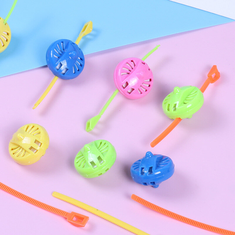 Juguetes tradicionales intelectual para niños, juguetes pequeños de plástico giratorio para niños