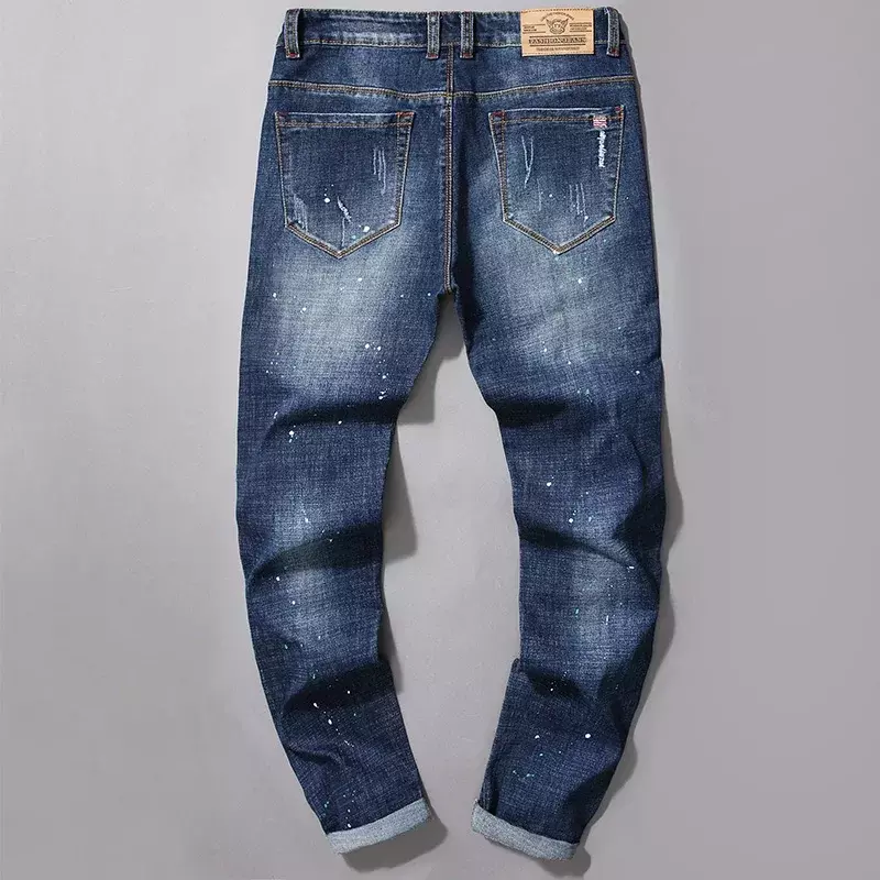 Primavera e autunno nuovo 2024 Jeans perforati alla moda pantaloni elastici Slim Fit da uomo moda Casual pantaloni in Denim a gamba dritta