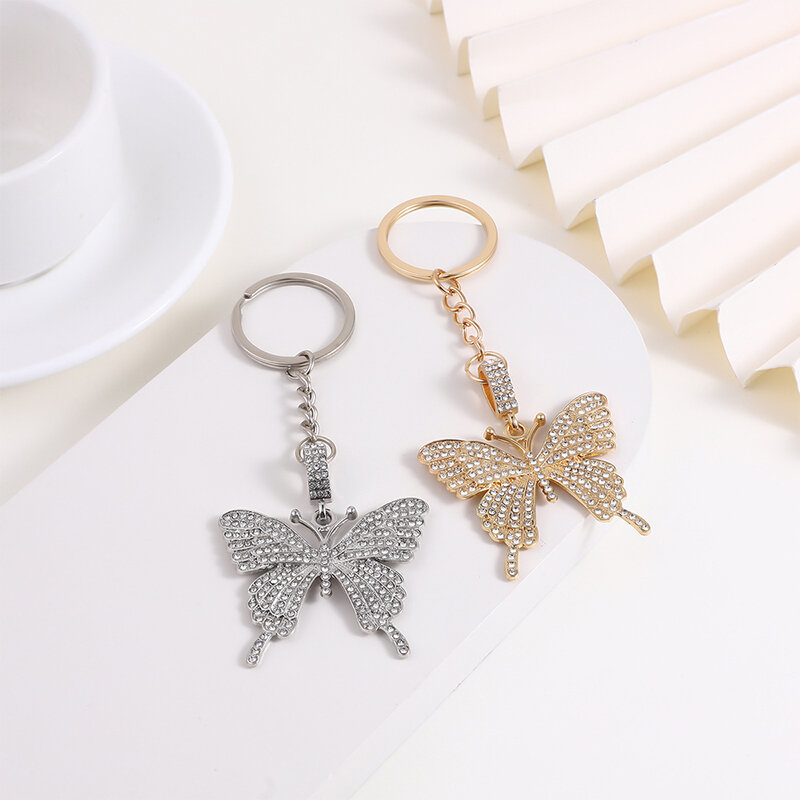 LLavero de mariposa de diamantes de imitación brillantes para mujeres y niñas, lindo Animal volador creativo, bolsa de insectos colgante, accesorios de decoración