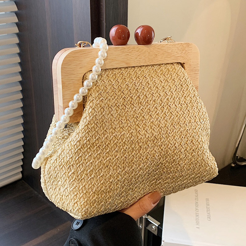 Borsa a tracolla in paglia intrecciata alla moda per le donne 2024 borsa a Clip con manico superiore in legno estivo borse firmate di lusso borsa femminile di tendenza