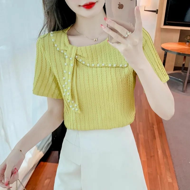 Doux O-cou Épissé Couleur Unie À Lacets Perles T-Shirts Femmes Vêtements 2024 Été Nouveau Lâche Décontracté Hauts T-shirt Coréen