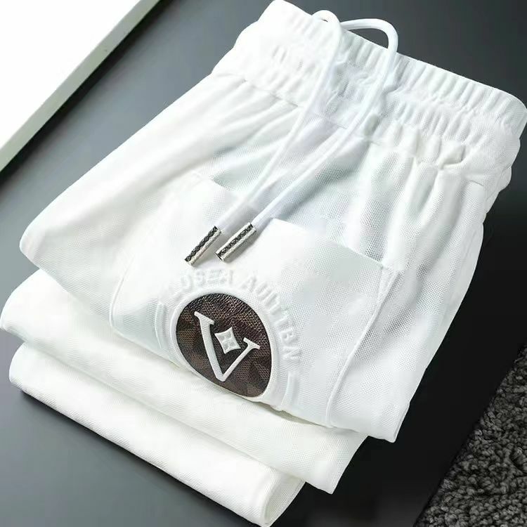 Luksusowe letnie cienkie żakardowe białe spodnie męskie Slim Fit i legginsy do wysokiej klasy spodni ochronnych dla mężczyzn
