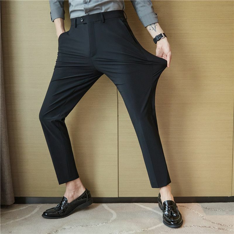 Modni mężczyźni Slim Fit ciemnoszary Smart półformalne spodnie do garnituru wiosna lato nowy lodowy jedwab wysoka elastyczność przycięte spodnie biznesu 2024