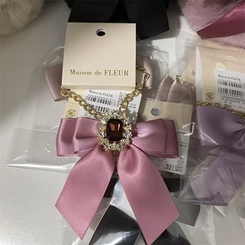 Dolce carino stile giapponese fiocco diamanti borse pendenti per le signore moda tutto-fiammifero maniglia catena di metallo accessori per bagagli da donna