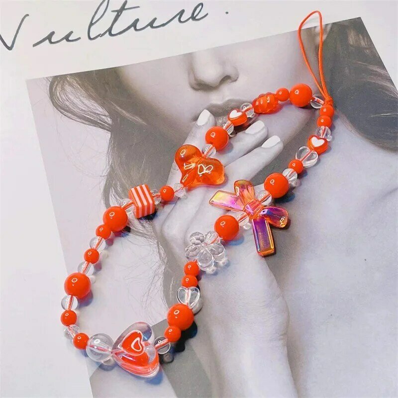Bracelet de charme perlé avec nœud pour téléphone portable, bijoux pour femmes et filles, porte-téléphone papillon, pendentif en perles, décoration, vente en gros