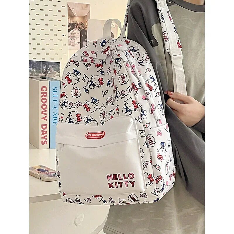 Sanrio Hello Kitty Student Schoolbag bonito dos desenhos animados, leve e grande capacidade infantil, mochila de cachorro pendurado de jade, novo