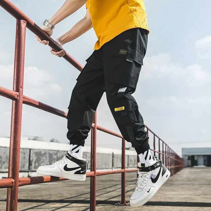 Nowe joggersy Hip hopowe spodnie Cargo spodnie haremki męskie wstążki z wieloma kieszeniami męskie spodnie dresowe Streetwear codzienne męskie spodnie