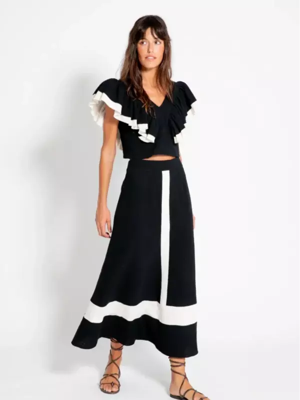 Pakaian Wanita leher V lengan daun teratai elegan, setelan atasan modis warna hitam putih dengan rok berlipat untuk musim panas