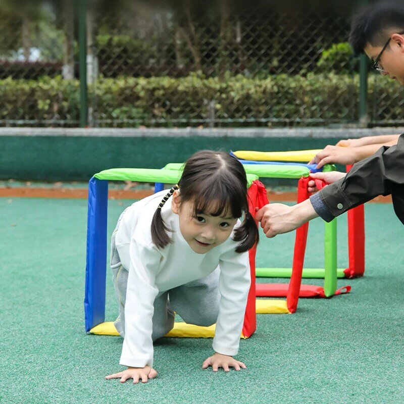 Bambini divertenti giochi all'aperto cornice per saltare fori per trapano giocattoli integrazione sensoriale formazione asilo puntelli sportivi per bambini giochi multipli