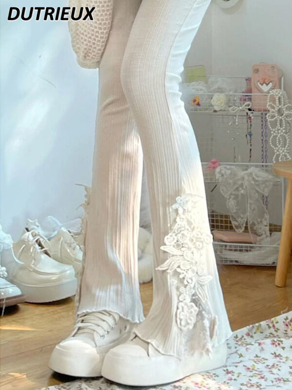 Płatek z wysokim stanem haftowane koronkowe słodkie spodnie na co dzień dla kobiet lato 2024 nowe modne wzór w paski spodnie bootlegowe