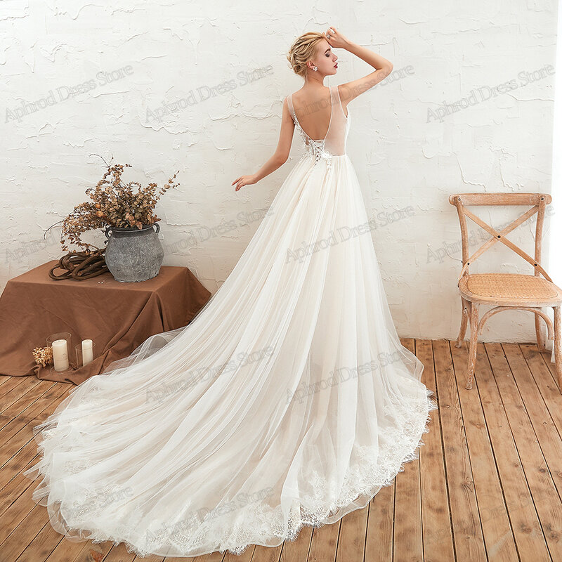 Wdzięczne suknie ślubne iluzoryczne tiulowe suknie ślubne z dekoltem w serek na formalne przyjęcie ładne Vestidos De Novia 2024