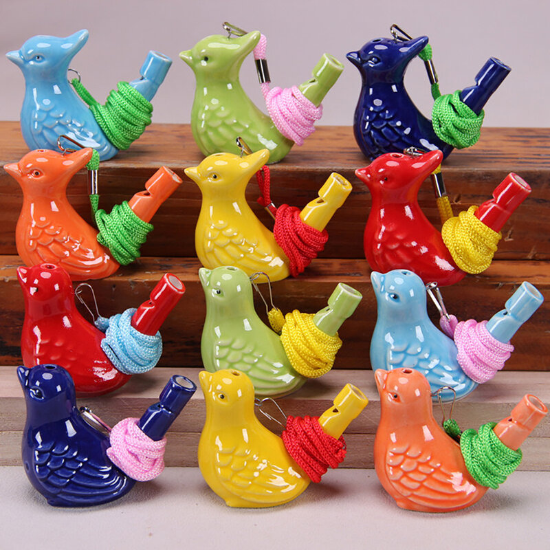 Giocattoli per uccelli in ceramica con fischietti animali che cambiano suono quando vengono aggiunti all'acqua