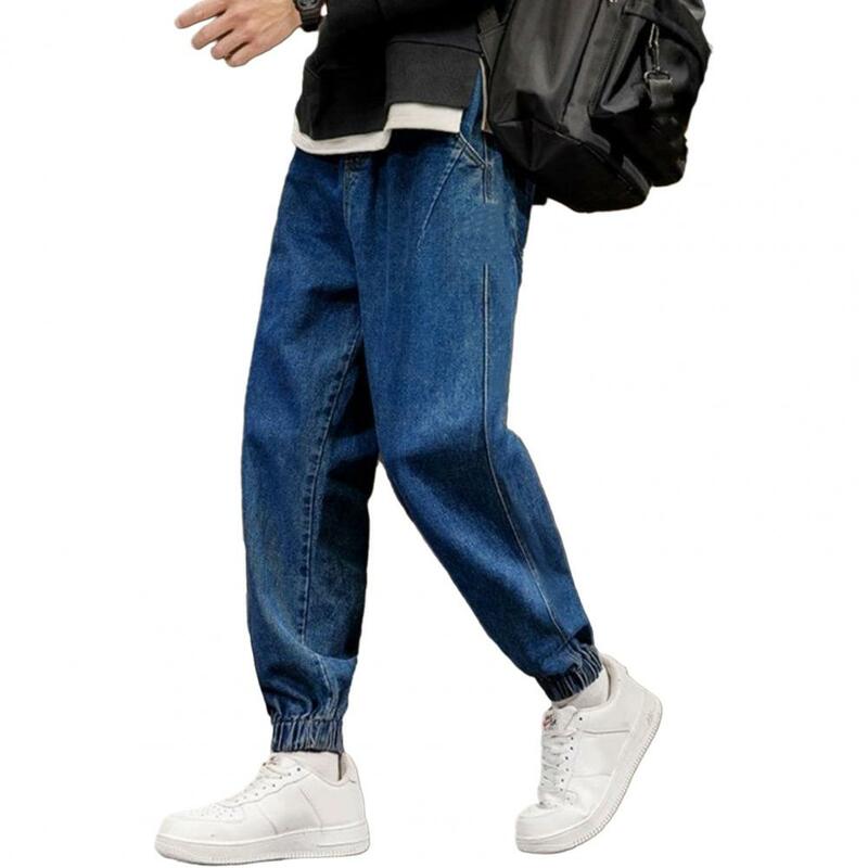 Jeans de cintura elástica masculino com bolsos, calça jeans com faixas no tornozelo, ajuste solto, virilha de comprimento, calça casual