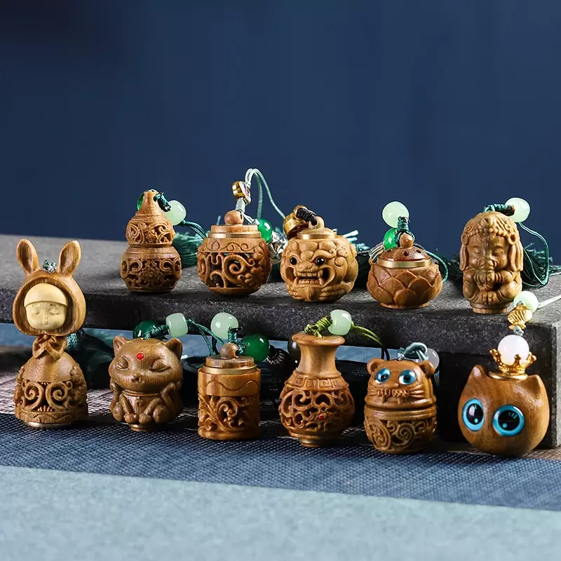 سلسلة مفاتيح مجوفة من خشب الصندل الأخضر الطبيعي ، قرع لوتس بيكسيو ، قلادة منظر طبيعي ، مجوهرات نحت الخشب في الكيس ، متجر