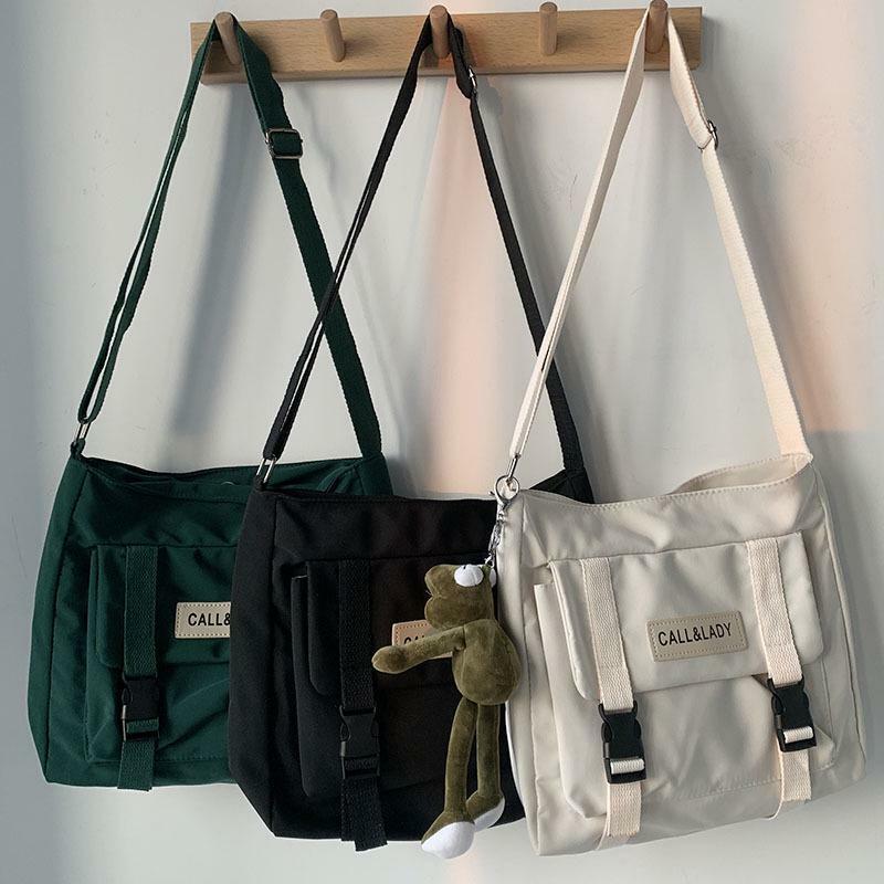 Tas kurir Jepang sederhana, tas kurir Korea, tas siswa nilon, tas kanvas tahan air, tas selempang wanita, paket tas untuk anak perempuan