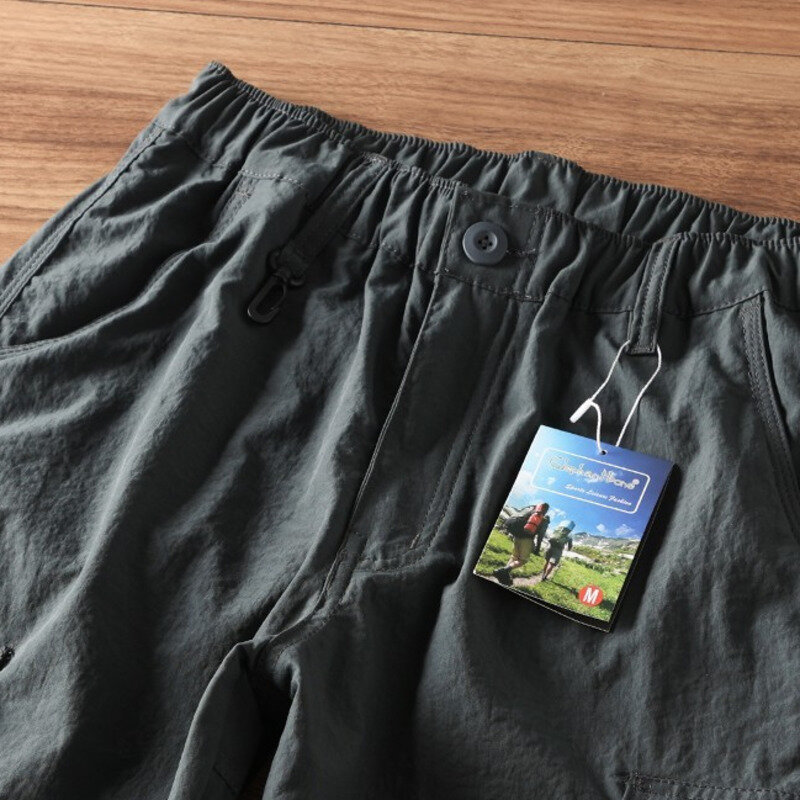 Мужские повседневные брюки-карго со съемными штанинами в стиле ретро, новинка 2024, модные однотонные легкие быстросохнущие брюки, модные штаны для поездок