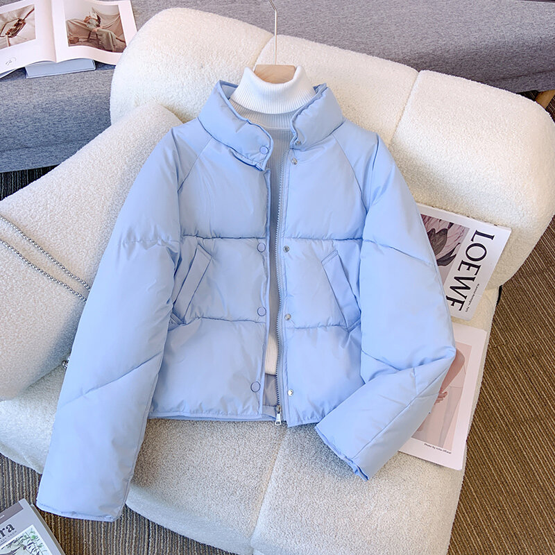 Damska zagęszczona puchowa kurtka bawełniana 2023 nowa zimowa moda na zamek błyskawiczny krótki bawełniany płaszcz minimalistyczny ciepła koszulka dojazdów do pracy
