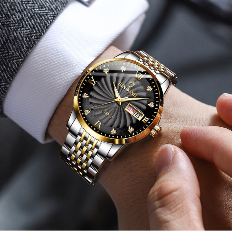 Jam tangan pria, arloji Stainless Steel emas tali padat Quartz bercahaya dan tanggal