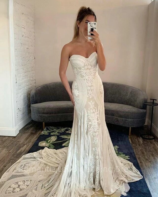 Gaun pernikahan putih putri duyung seksi tanpa tali gaun pengantin dengan renda bahu terbuka untuk wanita