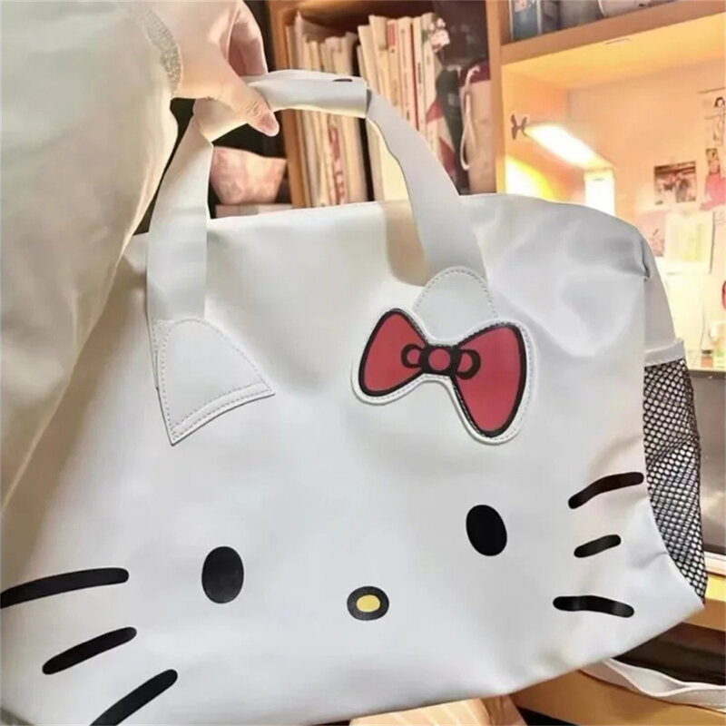 Bolsa de almacenamiento de viaje Kawaii Hello Kitty para mujer, bolso de mano cruzado de gran capacidad con lazo, Kt Sanrio, dibujos animados, a la moda