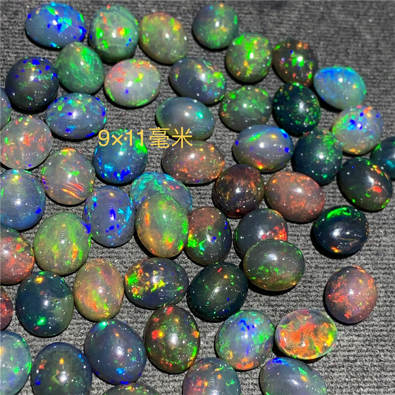 Nowy czarny naturalny Opal duże ziarno płaskie Opal goły kamień owalny 9*11 Mm może być używany jako pierścień wisiorek