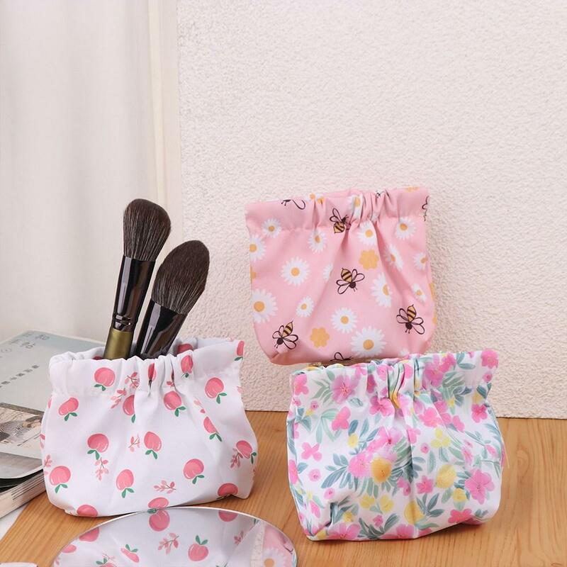 Mini bolsa de cosméticos de cuero Pu, bolsa de maquillaje, bolsa de almacenamiento de lápiz labial, bolsa de auriculares, bolsa de Primavera de flores, viaje