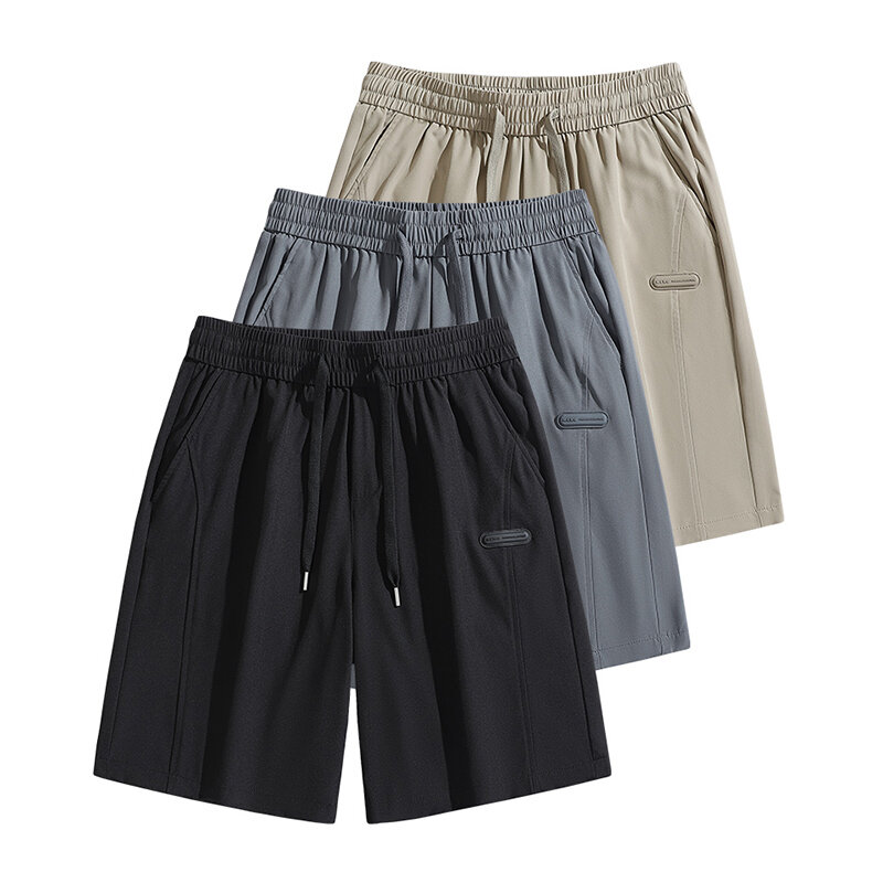 Mode einfarbig gespleißte Taschen gerade lässige Shorts Herren bekleidung 2024 Sommer lose koreanische elastische Shorts mit hoher Taille