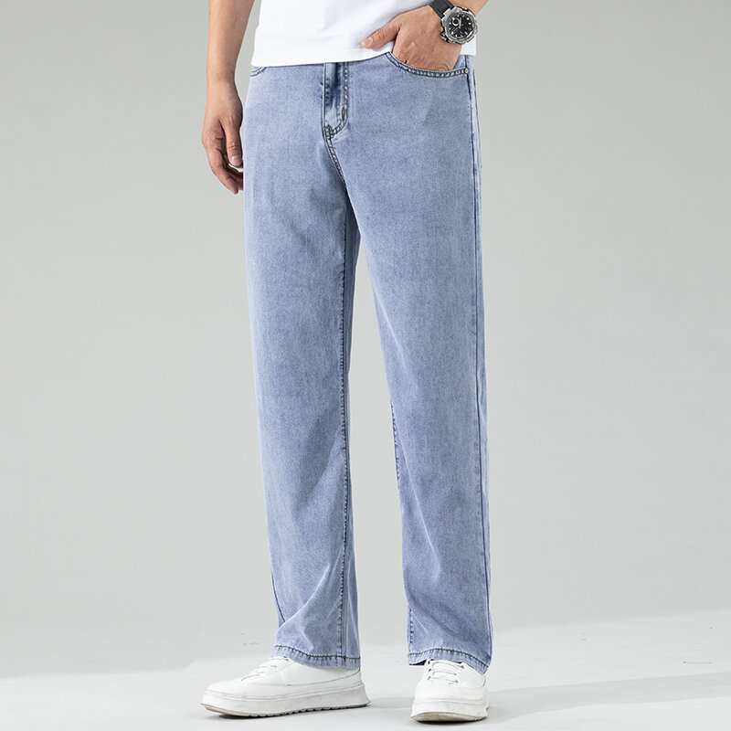 Klassische schwarze gerade Lyocell Jeans für Männer Sommer dünne weiche bequeme elastische lose Eis Seide Jeans hose Marken kleidung