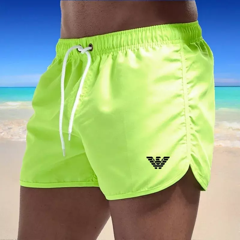 Celana pendek pantai binaraga pria, celana pendek olahraga Fitness gym kasual ramping keren Bermuda cepat kering musim panas untuk pria