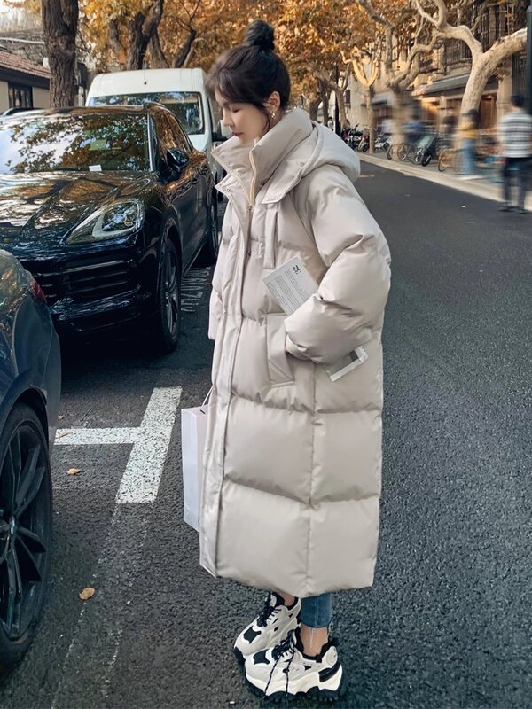 Chaqueta larga de plumón de algodón para mujer, abrigo holgado coreano, Parkas con capucha para Buggy, moda de invierno, novedad de 2023