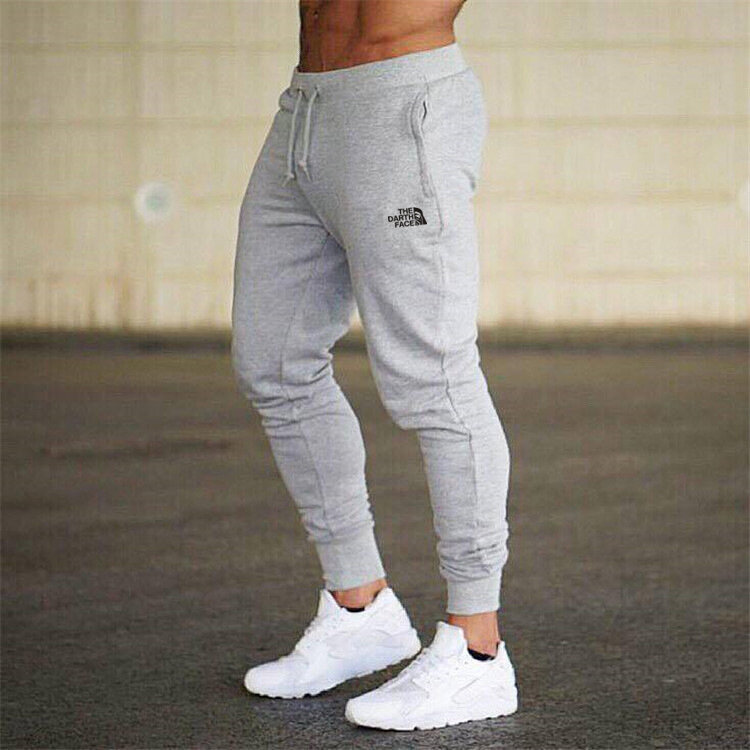 Jesień i zima nowy codzienne męskie spodnie jednolity kolor Outdoor Fitness sportowy mała stopa spodnie w paski marki wysokiej jakości spodnie