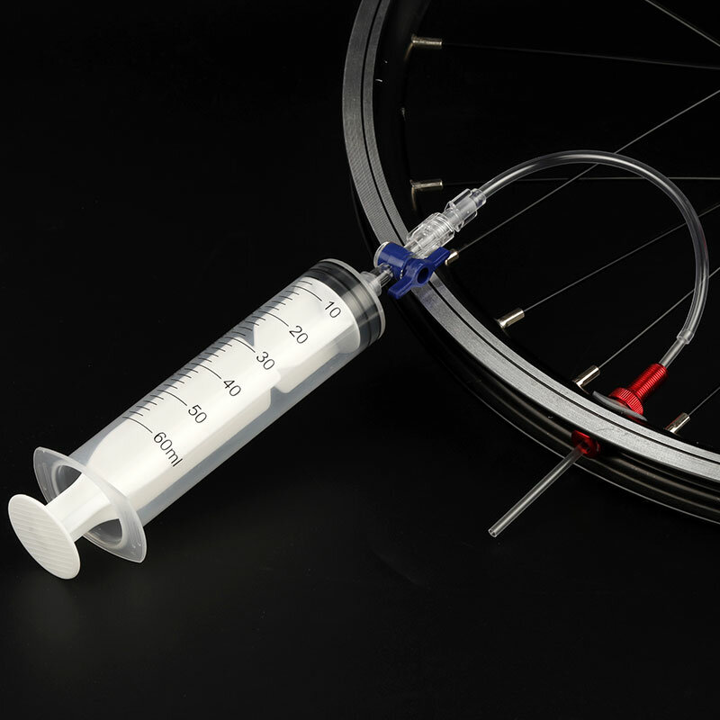 Iniettore di sigillante per pneumatici Tubeless per bicicletta da 60ml MTB strumento di iniezione del fluido per bici da strada Schrader/strumento per valvola Presta opzionale