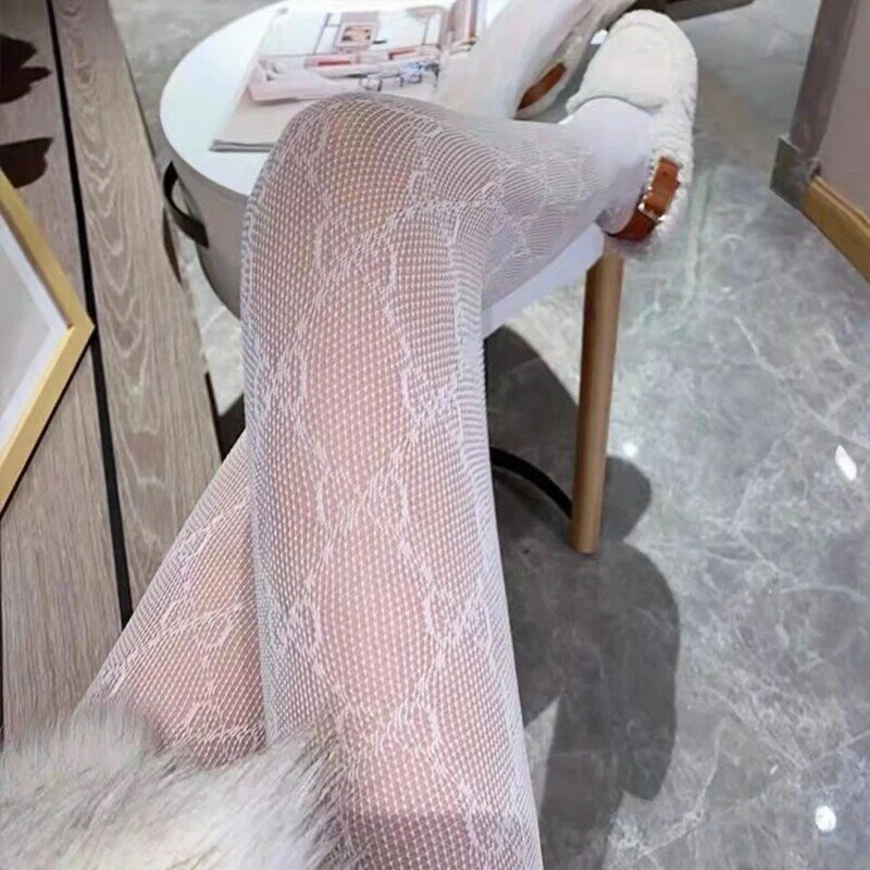 Silk stockings women's hot and sexy double G fishing net garter belt letter pantyhose small mesh mesh mesh stockings